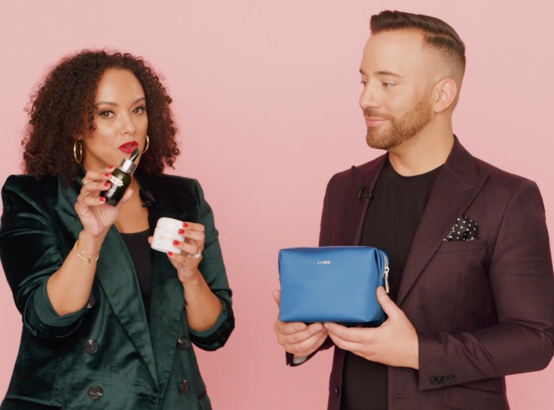 Man and woman holding make up accessories